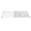 A white, adjustable shelf for a closet, shown from a side-angle. Anteprima dell’immagine prodotto