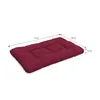 A dark red cushion with dimensions indicated by lines and text. Produktbild-Vorschau