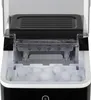 A close-up view of the interior of a portable ice maker, filled with ice cubes. Náhled obrázku produktu