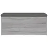 A front view of a storage bench with a gray upholstered top and a light gray wood-effect base. Náhled obrázku produktu