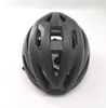 A black bicycle helmet is shown from a top-down perspective against a white background. Produktbild-Vorschau