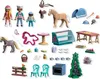 A collection of Playmobil figures, horses, and accessories for a Christmas baking-themed advent calendar. Produktbild-Vorschau
