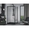 A modern bathroom with a black framed shower enclosure, a vanity with a sink, and a chair near a window. Podgląd zdjęcia produktu