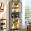 A corner of a room with a tall gray cabinet filled with various items, next to a window with blinds. Produktbild-Vorschau