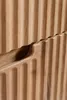 Close-up of carved wooden furniture with vertical grooves. Náhľad obrázku produktu