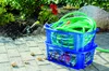 Gardening supplies are arranged on a paved patio next to a garden bed. Produktbild-Vorschau
