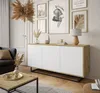 A modern living room with a sideboard, coffee table, and artwork. Náhled obrázku produktu