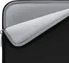 A close-up view of the interior of a black laptop sleeve. Náhľad obrázku produktu