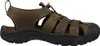 Side view of a brown leather sandal with a black sole. Produktbild-Vorschau