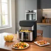 A kitchen scene with an air fryer and food. Produktbild-Vorschau