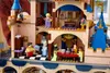 A detailed view of a LEGO Disney castle playset with several minifigures interacting within its rooms. Náhled obrázku produktu
