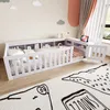 A child's bedroom with a white bed, shelves, and a rug. Náhľad obrázku produktu