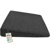 A dark gray ergonomic seat cushion is shown from a side angle on a white background. Produktbild-Vorschau