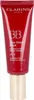 A red tube of Clarins BB Skin Detox Fluid with a gold cap. Voir les images du produit