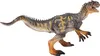 A toy dinosaur figure against a white background. Náhľad obrázku produktu