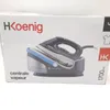 The image shows the packaging of an H.Koenig steam ironing station. Voir les images du produit
