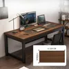 A modern home office setup with a computer desk, monitor, laptop, and desk lamp. Produktbild-Vorschau