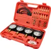 A red plastic case containing a set of four vacuum gauges and various adapters for synchronizing carburetors. Voir les images du produit