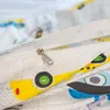 A close-up view of a zipper on children's bedding with a car pattern. Produktbild-Vorschau