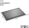 A dark gray cutting board is shown from a diagonal angle, with dimensions indicated by lines and text. Podgląd zdjęcia produktu