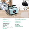 A person is holding a mug next to a sublimation heat press machine on a wooden table, with accessories like gloves and sublimation paper shown. Náhled obrázku produktu