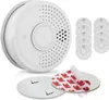 A white smoke detector is shown with a stack of smaller smoke detectors and adhesive mounting pads. Produktbild-Vorschau