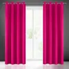 Two fuchsia curtains hanging in front of a window. Produktbild-Vorschau