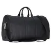 A black duffel bag is shown against a white background. Produktbild-Vorschau
