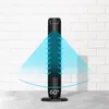 A black tower fan is shown in front of a white brick wall, with blue light emanating from it to indicate airflow. Voir les images du produit