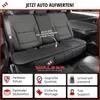 Interior of a car showing a seat cover on the back seats. Produktbild-Vorschau
