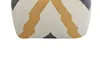 A close-up view of the bottom part of a pouffe with a geometric pattern. Podgląd zdjęcia produktu