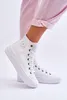 A person's legs wearing pink pants and white high-top sneakers. Produktbild-Vorschau