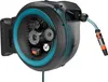 A close-up, cutaway view of a wall-mounted hose reel with internal mechanisms visible. Voir les images du produit