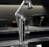 A modern kitchen faucet with a digital display, shown in a sleek kitchen setting. Produktbild-Vorschau