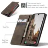 A brown leather flip case for a smartphone, shown open to reveal card slots and a phone screen displaying a cityscape. Produktbild-Vorschau
