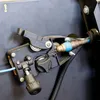 A close-up view of a welding torch wire feeder mechanism. Produktbild-Vorschau