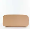 The bottom view of a tan leather handbag. Produktbild-Vorschau