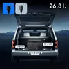 The back of an open SUV trunk at night, with a portable cooler inside and dimensions indicated. Náhled obrázku produktu