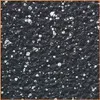A close-up view of a black surface with many small, shiny, circular or irregularly shaped particles scattered across it. Produktbild-Vorschau