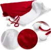 A close-up view of a red velvet Christmas sack with white trim and pom-poms, along with magnified views of the fabric textures. Produktbild-Vorschau