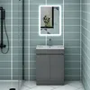 A modern bathroom vanity with a sink and cabinet, set against tiled walls. Produktbild-Vorschau