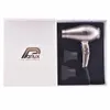 A hairdryer and its accessories are displayed inside an open box. Náhled obrázku produktu