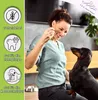 A woman is feeding a dog a treat, with informational icons on the left. Podgląd zdjęcia produktu
