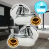 Two chrome-plated S-shaped pipe connectors with brass fittings, set against a blurred background of a modern bathroom. Produktbild-Vorschau