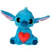 A blue Stitch plush toy holding a red heart. Podgląd zdjęcia produktu