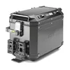 A black aluminum motorcycle pannier with a lock and mounting bracket. Produktbild-Vorschau