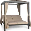 An outdoor double lounge chair with a canopy and curtains. Produktbild-Vorschau