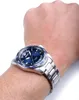 A man's wrist wearing a Seiko watch. Náhled obrázku produktu