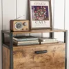 A vintage-style shoe cabinet with books and a radio on top. Náhľad obrázku produktu