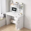 A white computer desk with shelves and drawers, set up in a room with natural light from a window. Náhľad obrázku produktu